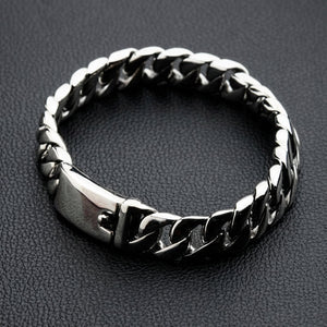 Side view of 11mm wide men's silver curb chain bracelet showing link thickness and mirror shine
