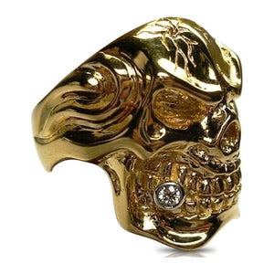 Solid 14k gold skull ring with sapphire eye and diamond tooth — interior view