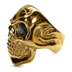 Solid 14k gold skull ring with sapphire eye and diamond tooth — sapphire eye detail