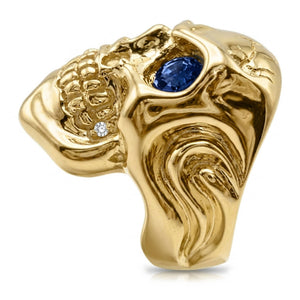 Solid 14k gold skull ring with sapphire eye and diamond tooth — side profile