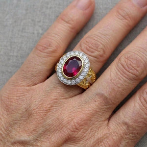 Ruby-Red Stone Gold-Plated Cross Bishop Ring, worn on an adult model