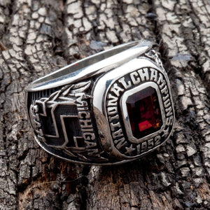 1952 Michigan State championship ring angled view with red CZ