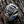 Tilted view capturing the 1952 engraving and the dark blue centerpiece catching light