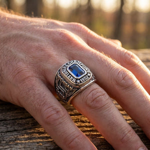 Top view of the Michigan State 1952 championship ring replica worn on a man's hand