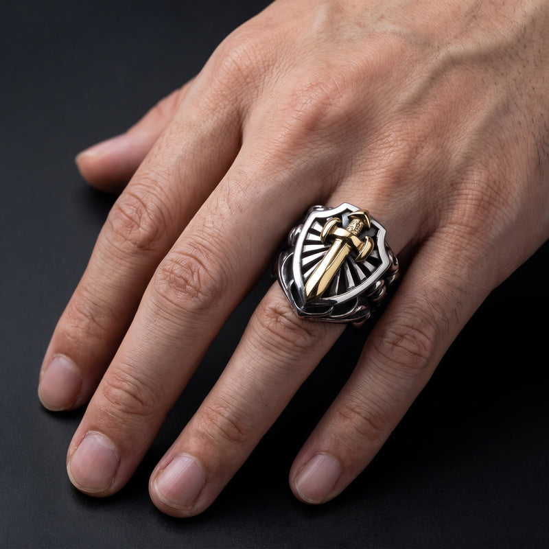Warrior shield and gold sword sterling silver ring worn on a natural hand