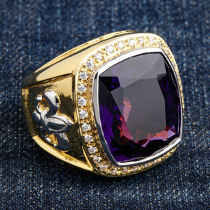 Gold-Plated Amethyst Fleur-de-Lis Bishop Ring showing purple cushion amethyst, clear halo and left fleur-de-lis shoulder.