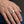 Natural Amethyst Gold & Silver Two-Tone Ring, worn on one middle finger in a natural hand close-up