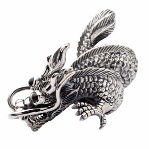 Black CZ Eye Dragon Sterling Silver Statement Ring. Coiled body left profile.