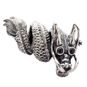 Black CZ Eye Dragon Sterling Silver Statement Ring. Coiled dragon front.
