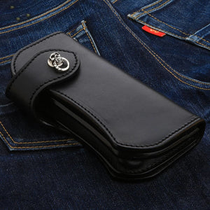Black Leather Skull Snap Long Wallet, front diagonal denim
