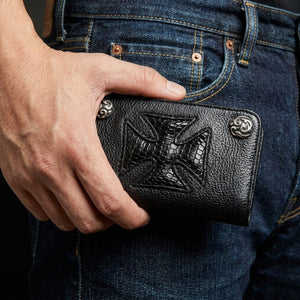 Black lizard cross biker wallet held in hands