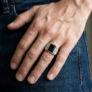 Black onyx eagle silver ring on a natural five-finger hand
