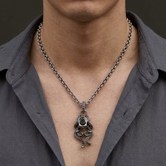 Collana con teschio e polpo in argento sterling e onice nera