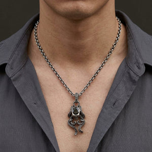 Black Onyx Octopus Skull Sterling Silver Necklace, worn on the neck with collarbones, shoulders and upper chest visible