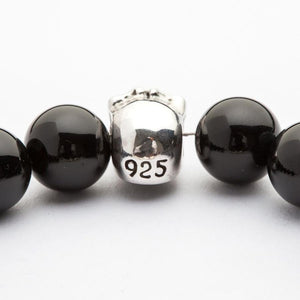 Black Onyx Sterling Silver Skull Bracelet — hallmark bead detail