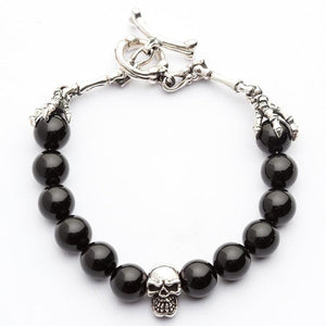 Black Onyx Sterling Silver Skull Bracelet — open bracelet layout
