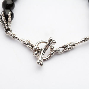 Black Onyx Sterling Silver Skull Bracelet — skeleton toggle closeup