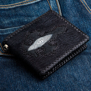 Black Shark Skin Bifold with Stingray Cross showing the shark-grain front and pearl-marked cross from the opposite side.
