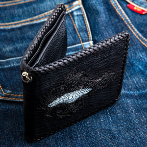 Black Shark Skin Bifold with Stingray Cross showing the cross panel above the partly opened bifold.