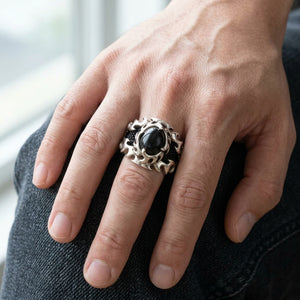 Black Star Stone Sterling Silver Flame Ring, worn on hand