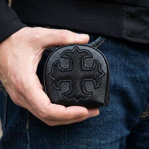 Black Stingray Cross Leather Coin Wallet, held in hand