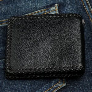 Black Stingray Cross Bifold Wallet, back on denim