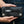 Black Stingray Cross Leather Wallet, held at the waist