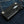 Black Stingray Cross Leather Wallet, opposite front denim