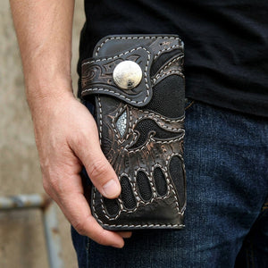 Black Demon Stingray Leather Long Biker Wallet, held at hip level