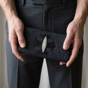Black stingray Gothic cross long wallet held in hands