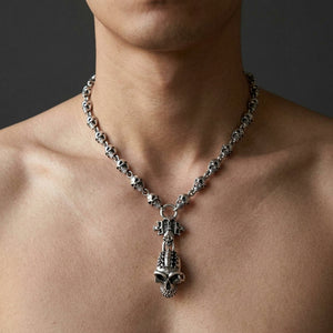 Black Stone Mohawk Skull Sterling Silver Necklace, worn on the neck with collarbones, shoulders and upper chest visible