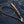 Black and Tan Braided Leather Wallet Chain, sweeping curve denim