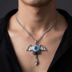 Blue Eyeball Dragon Wing Tail Sterling Silver Pendant styled on a silver chain with a dark shirt