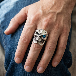 Blue Topaz Eye Sterling Silver Skull Ring, worn on hand