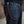 Red and black braided leather wallet chain clipped to jeans for scale