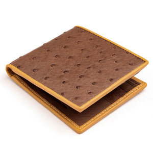 Brown Quill Ostrich Bifold with Tan Edging showing the brown quill front partly folded against white.