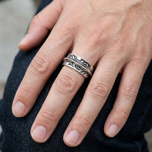 Carved Wave Sterling Silver Band Ring, worn on the hand