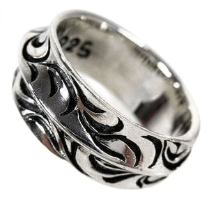Bague anneau en argent massif à vagues sculptées — vue en biais