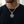 Chopper Maltese Cross Sterling Silver Pendant styled on a silver chain with a dark shirt