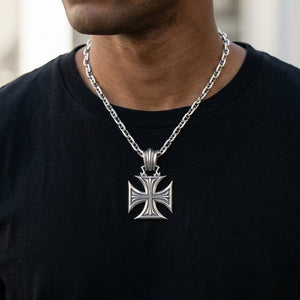Chopper Maltese Cross Sterling Silver Pendant styled on a silver chain with a dark shirt