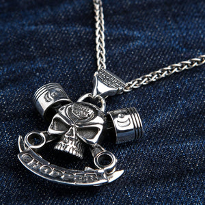 Chopper Skull and Piston Sterling Silver Pendant shown in skull bail angle view.