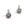 Boucles d'oreilles pendantes en argent sterling avec couronne et oxyde de zirconium transparent. Les deux couronnes sont présentées sous des angles de trois quarts avec des arches perlées et des centres transparents.