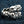 Clear CZ Star Skull Sterling Silver Ring, ring on denim left