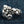 Clear CZ Star Skull Sterling Silver Ring, ring on denim right