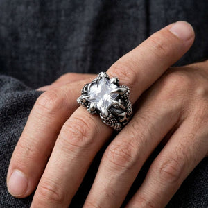 Clear Stone Dragon Claw Sterling Silver Ring, worn on an adult model