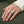 Clear Topaz Fleur-de-Lis Sterling Silver Ring worn on an adult hand.