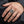 Cobra skull sniper silver ring worn on a hand, showing the ring face and band