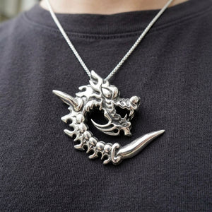 Coiled Flame Dragon Sterling Silver Pendant, worn chest detail