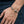 Compact Twin-Skull Sterling Silver Open Cuff, worn on an adult wrist