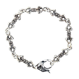 Dorje Vajra Sterling Silver Link Bracelet showing the repeated curled dorje motifs and engraved clasp from above.